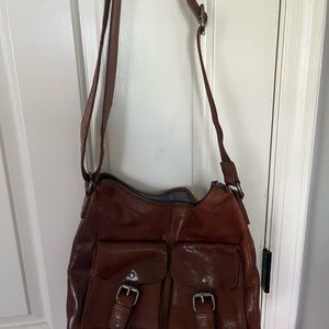 Spikes & Sparrow brown leather bag is gorgeous. Roomy and great for summer